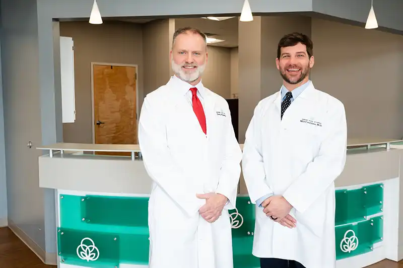 Dr. Pinson and Dr. Cauthen stand together as the surgical team at Surgical Clinic of Tupelo in Tupelo, MS.